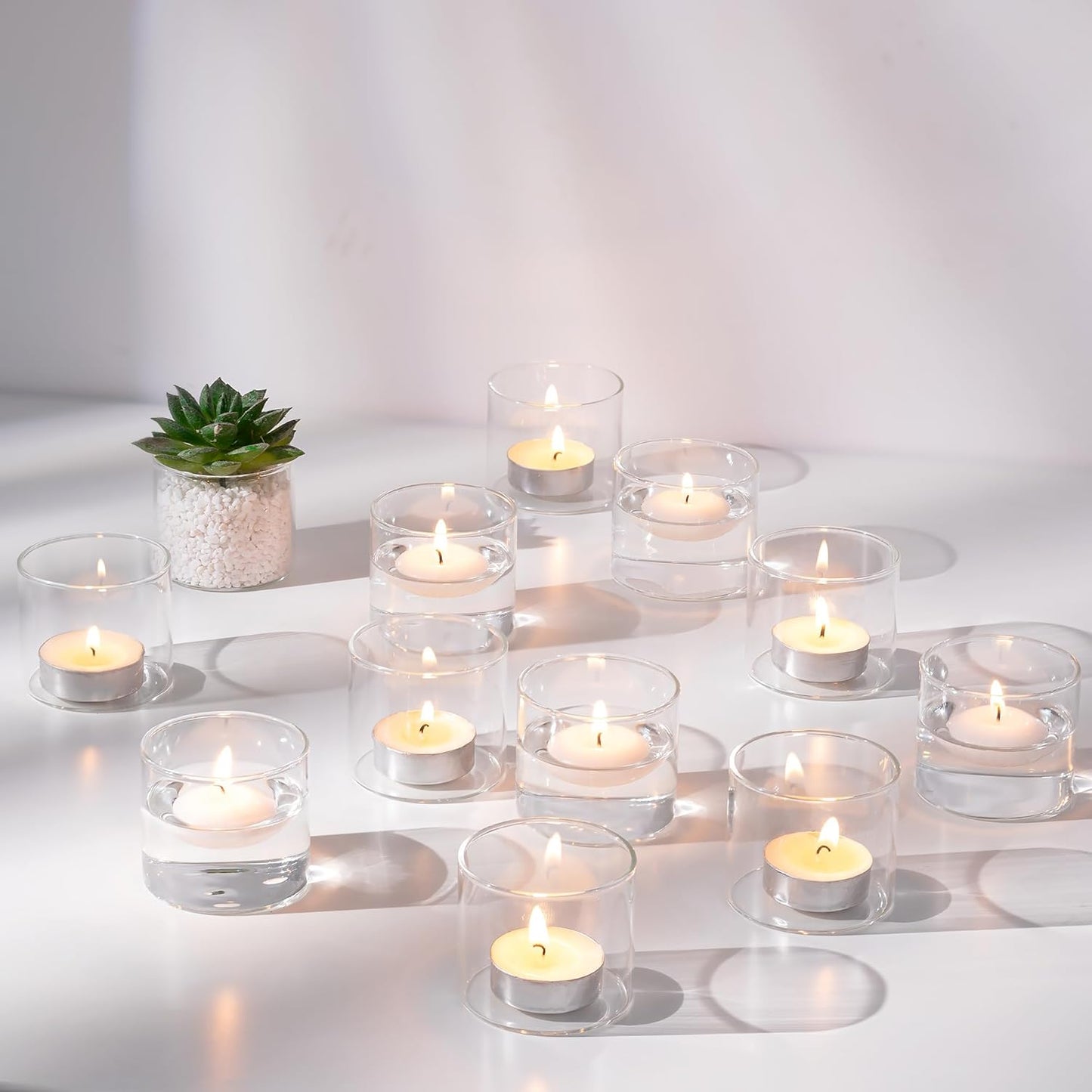 NUPTIO Clear Tealight Candle Holders: Set of 24 Glass Votive Holders Bulk - Small Floating Candleholder for Wedding Birthday Holiday Table Centerpieces Decoration (2.24 x 1.97 inch)