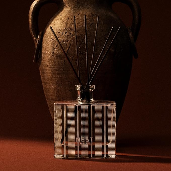 NEST New York Reed Diffuser, Moroccan Amber - 5.9 fl oz - Fragrance for Up to 90 Days - Reusable, Refillable Glass Holder - Includes 8 All-Natural Reed Sticks - Flame Free