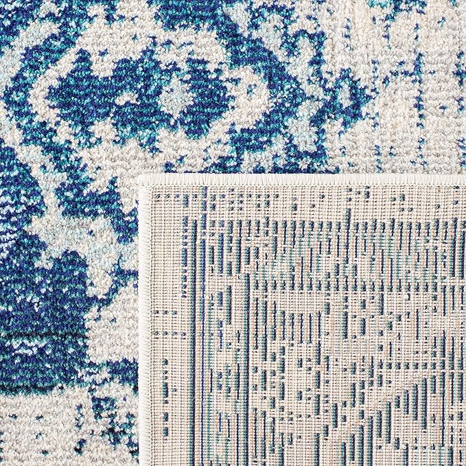 SAFAVIEH Monaco Collection Area Rug - 9' x 12', Ivory & Blue, Boho Chic Medallion Distressed Design, Non-Shedding & Easy Care, Ideal for High Traffic Areas in Living Room, Bedroom (MNC243A)