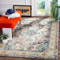 SAFAVIEH Monaco Collection Area Rug - 6'7" x 9'2", Grey & Light Blue, Boho Chic Medallion Distressed Design, Non-Shedding & Easy Care, Ideal for High Traffic Areas in Living Room, Bedroom (MNC243G)
