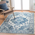 SAFAVIEH Monaco Collection Area Rug - 9' x 12', Ivory & Blue, Boho Chic Medallion Distressed Design, Non-Shedding & Easy Care, Ideal for High Traffic Areas in Living Room, Bedroom (MNC243A)